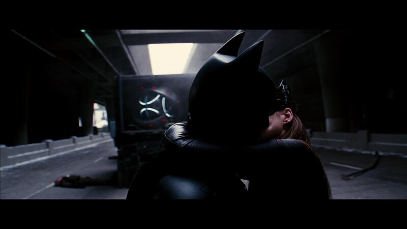 Batman and Catwoman embrace