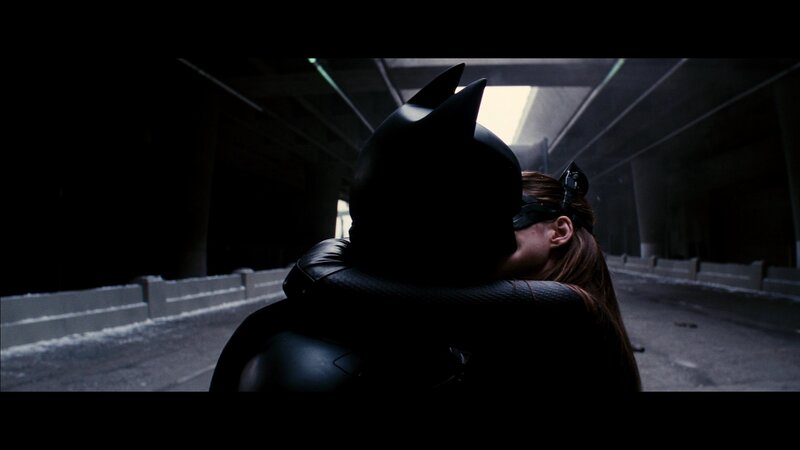 Batman and Catwoman embrace