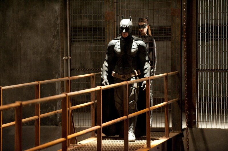 Batman and Catwoman in a prison