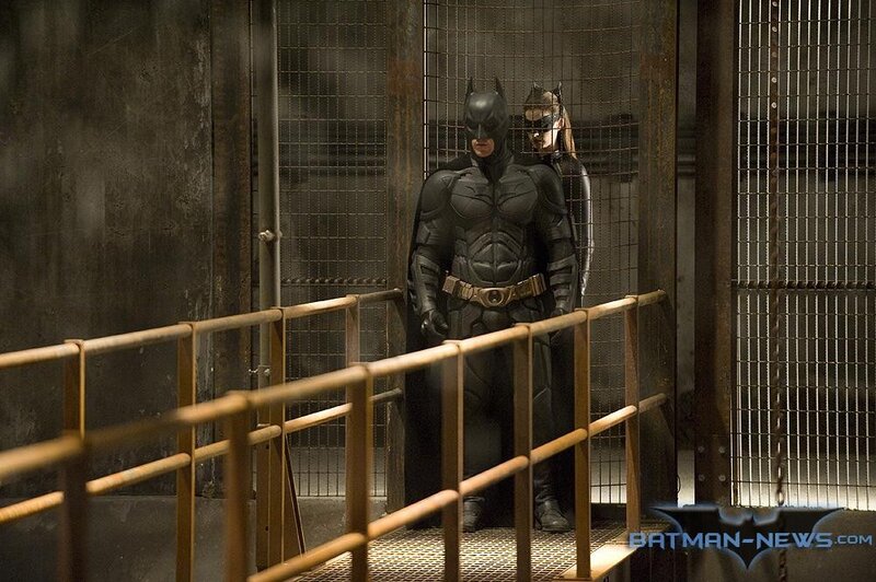 Batman and Catwoman in a prison