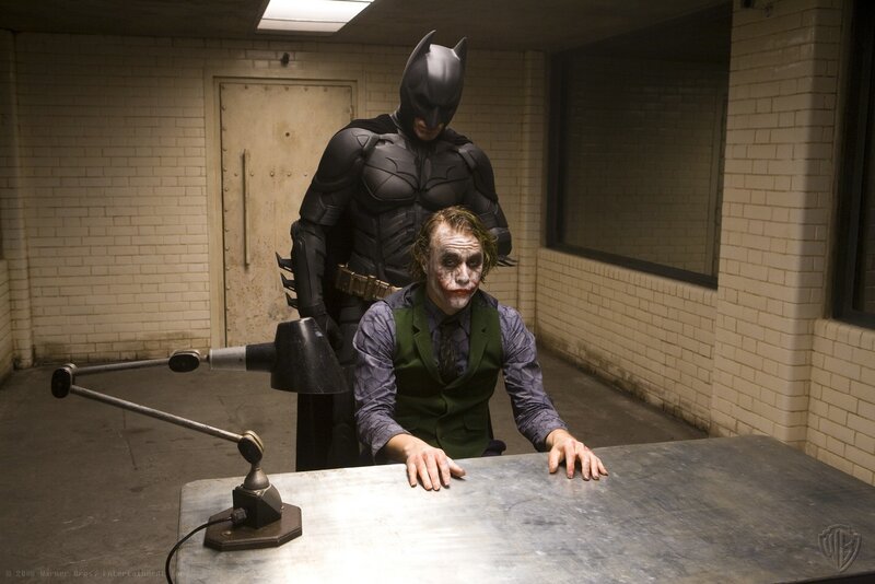 Batman and Joker in interrogation room