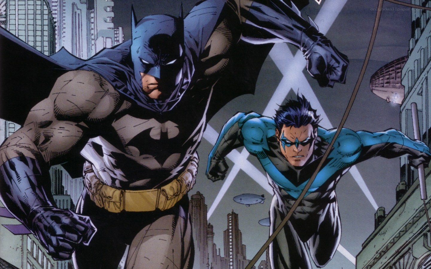 Batman and Nightwing in action