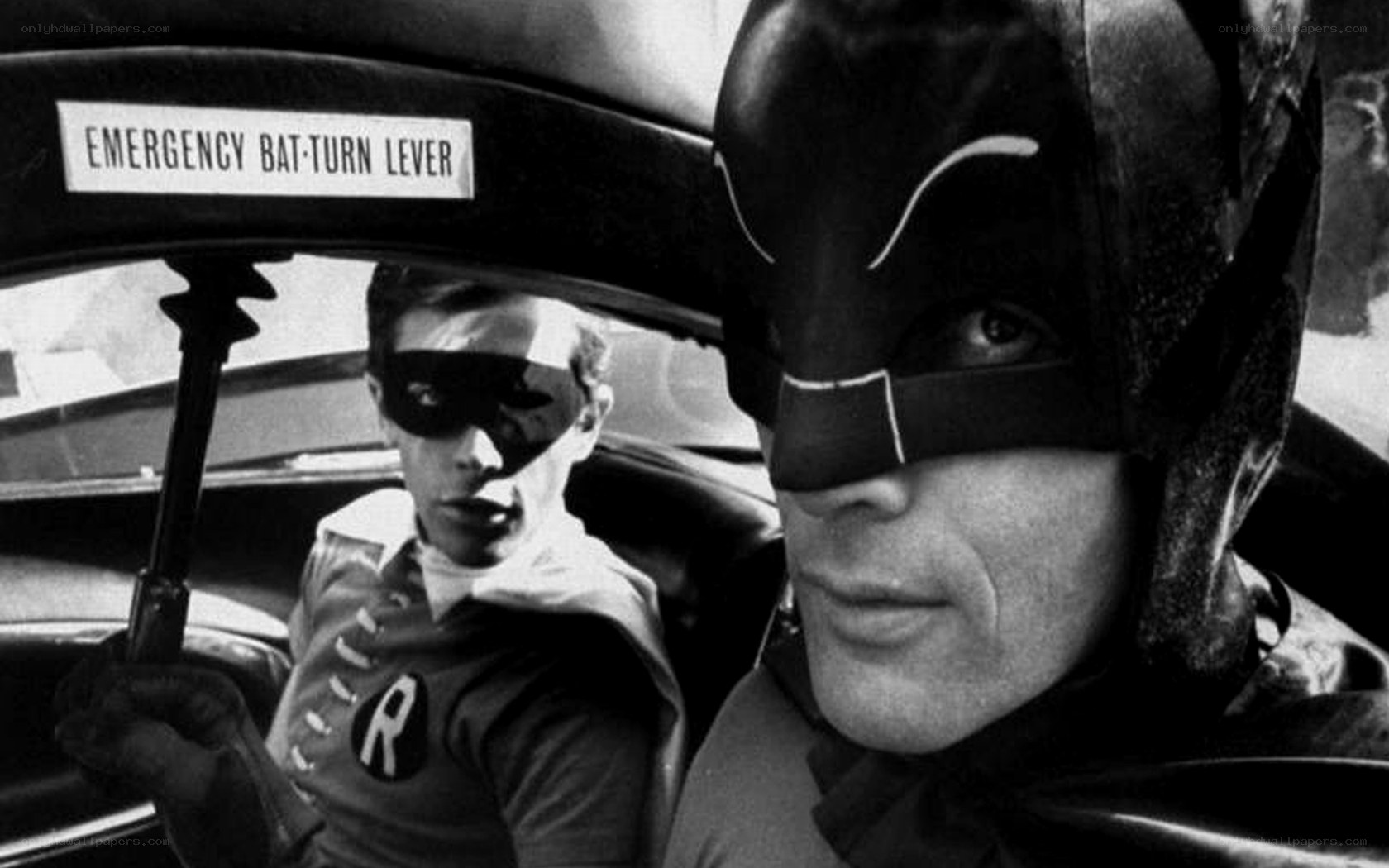Batman and Robin in the Batmobile