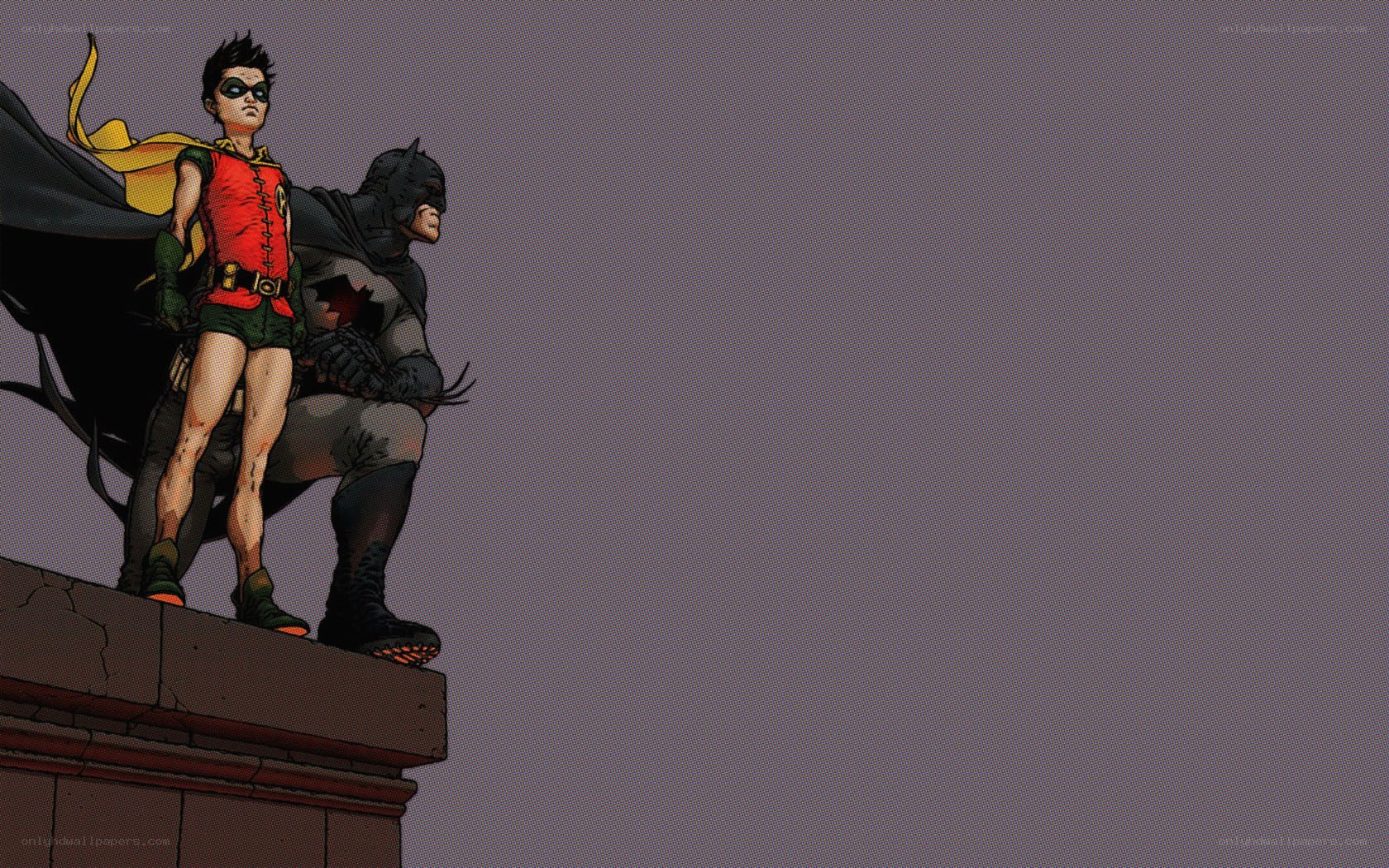 Batman and Robin on a rooftop