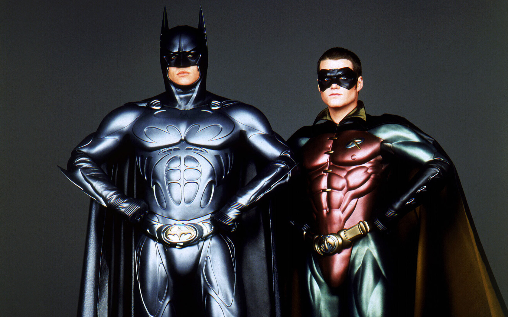Batman and Robin stand together