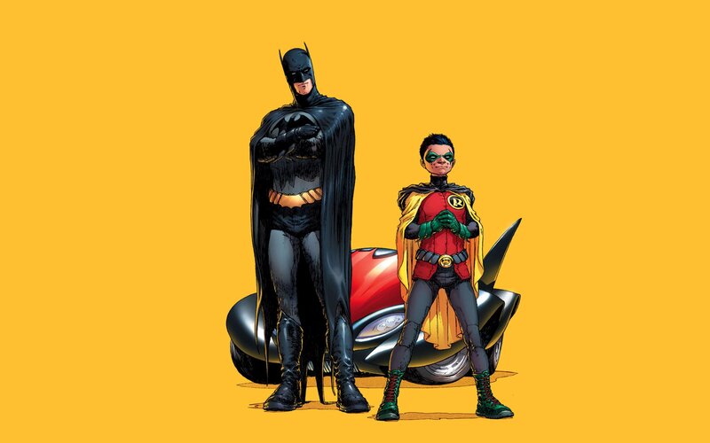 Batman and Robin standing together