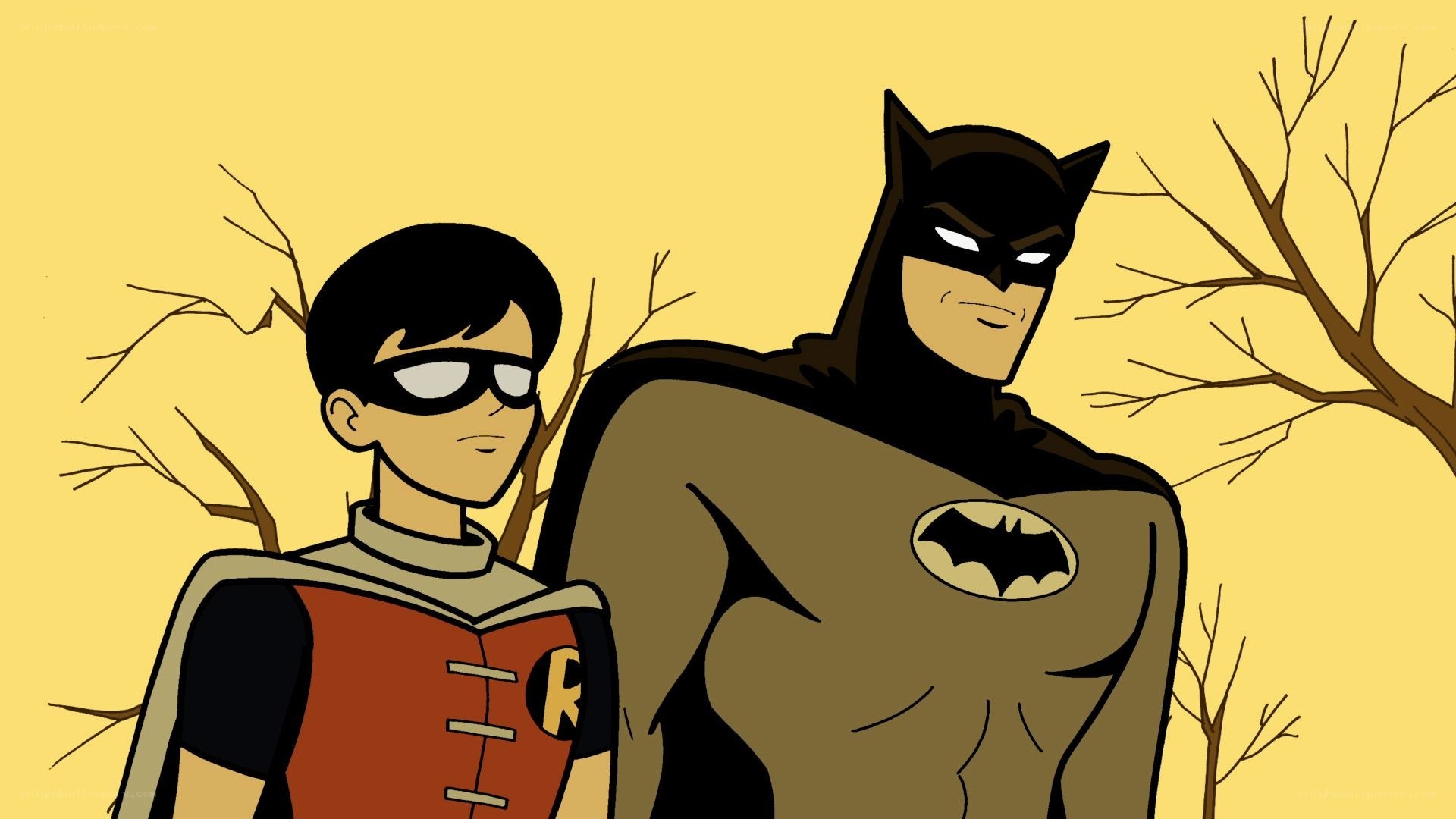 Batman and Robin standing together