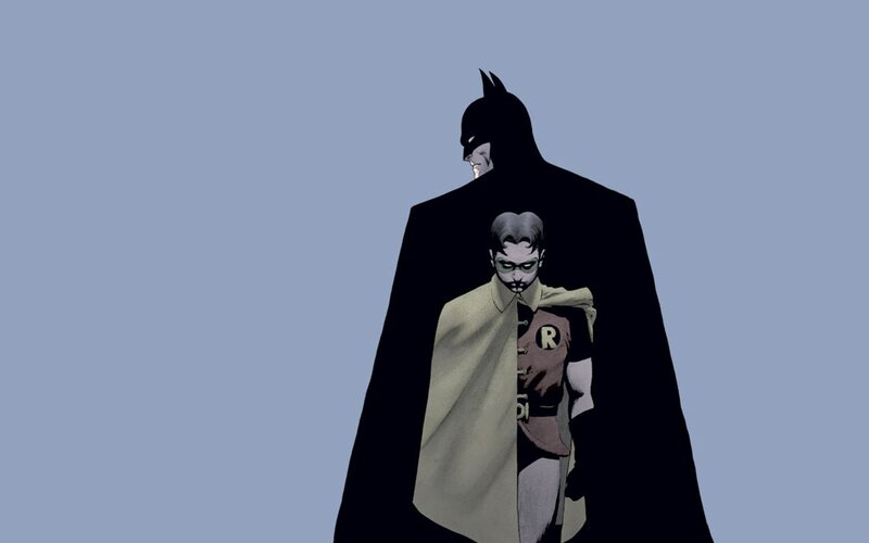 Batman and Robin standing together