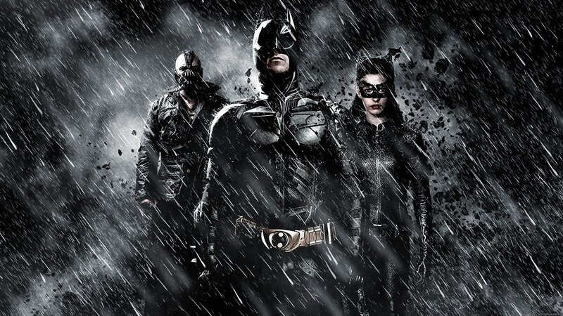 Batman, Bane, and Catwoman in rain