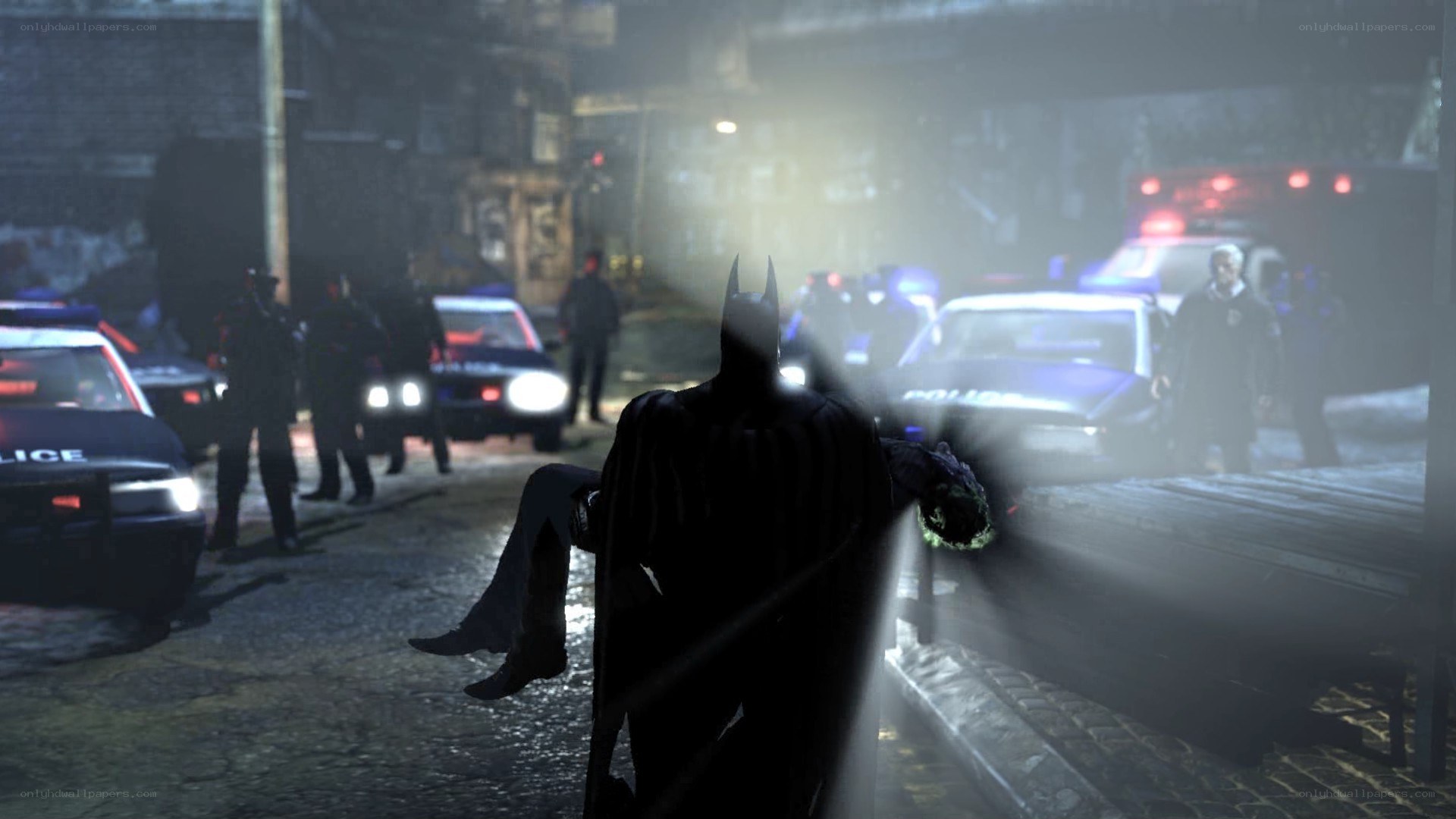 Batman carrying a body at night