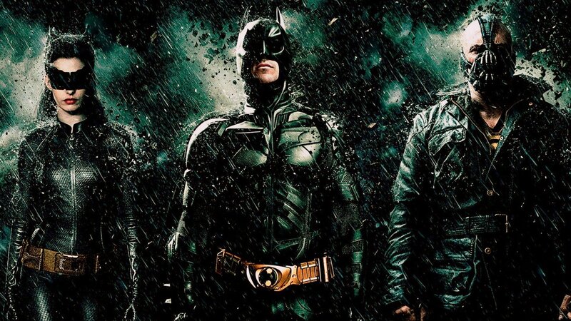 Batman, Catwoman, and Bane in rain