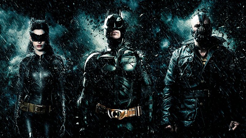 Batman, Catwoman, and Bane in rain