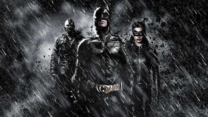 Batman, Catwoman, and Bane in rain