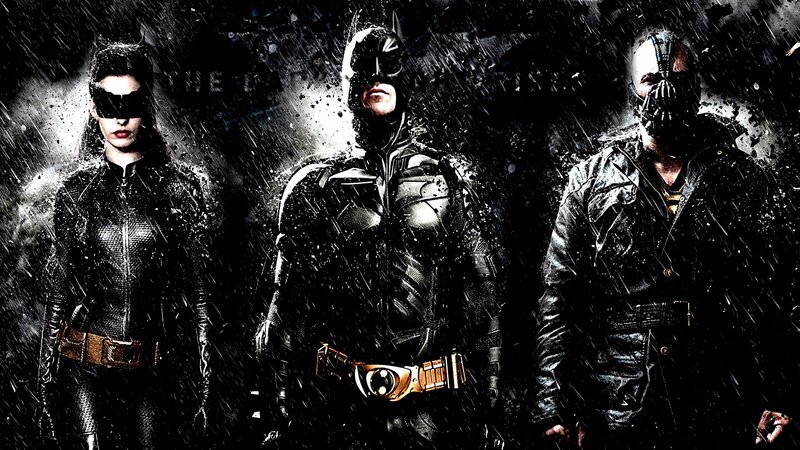 Batman, Catwoman, and Bane in rain
