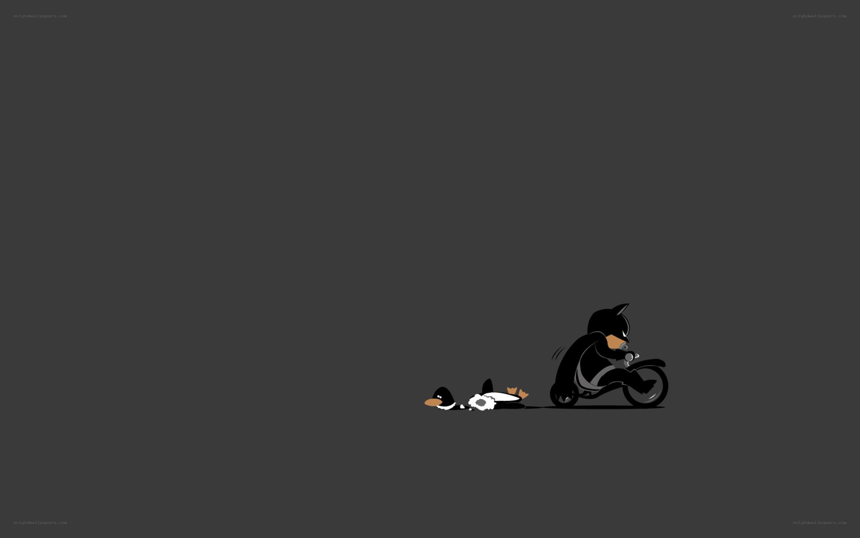 Batman chasing penguin on bike