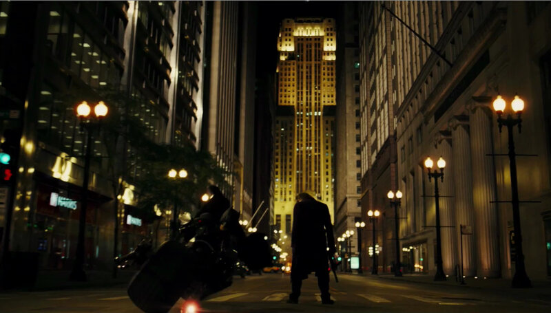 Batman confronts a figure at night