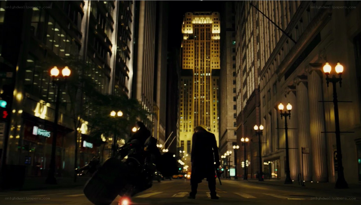 Batman confronts a figure at night