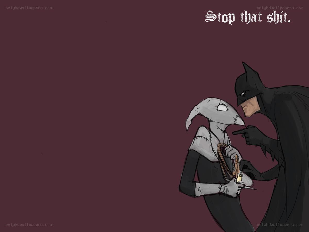 Batman confronts a masked figure