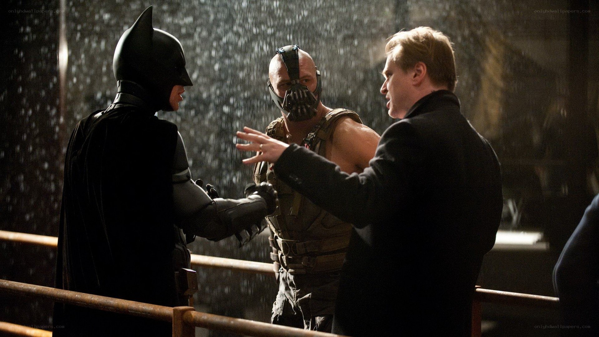 Batman confronts Bane and a man