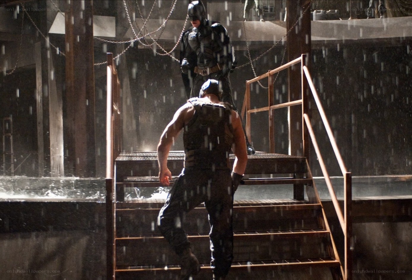 Batman confronts Bane in rain