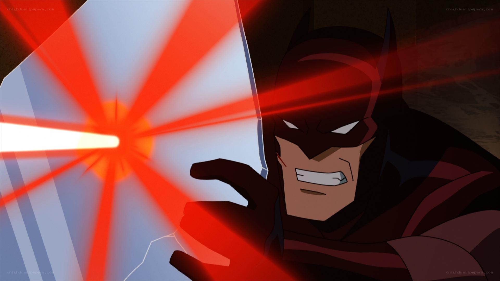 Batman deflects laser blast