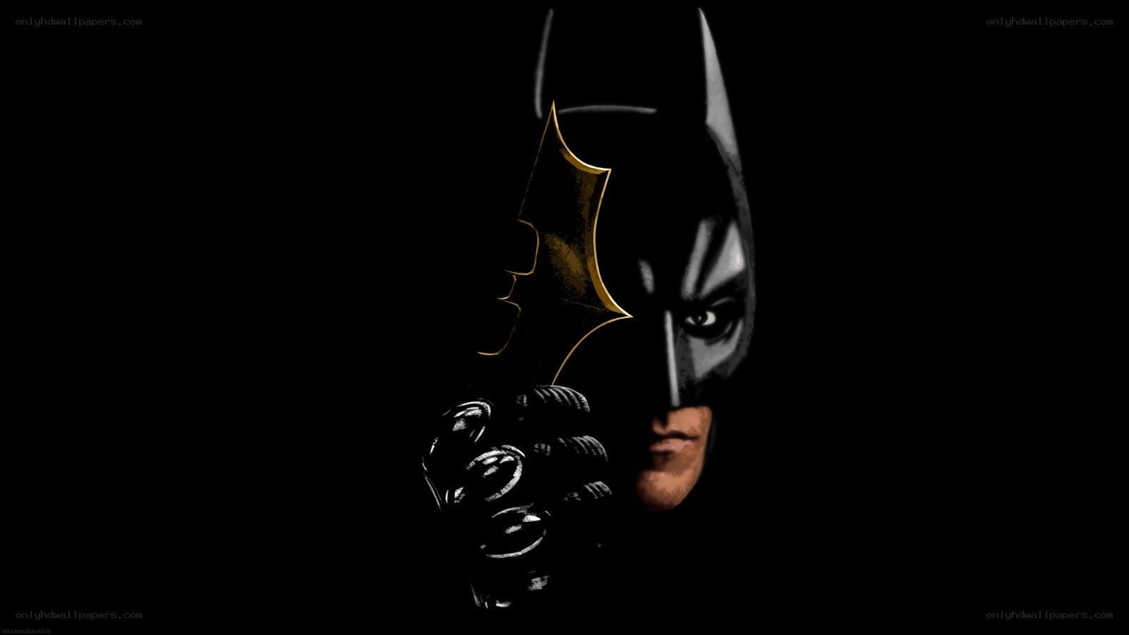 Batman holding a bat symbol