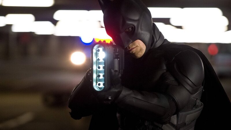 Batman Holding a Device — Black