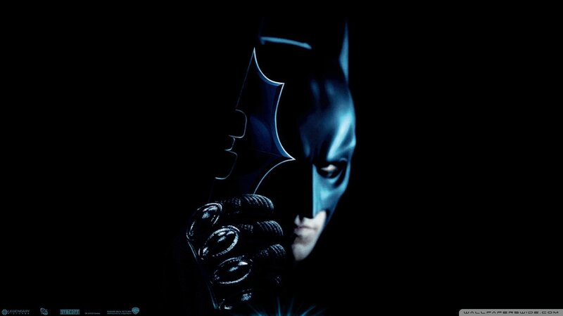Batman Holding Bat Symbol
