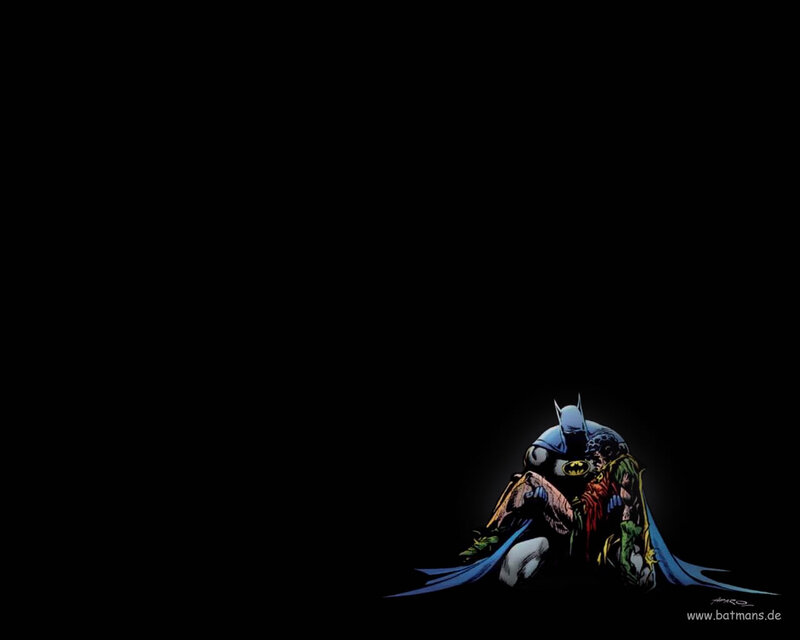 Batman holding Robin