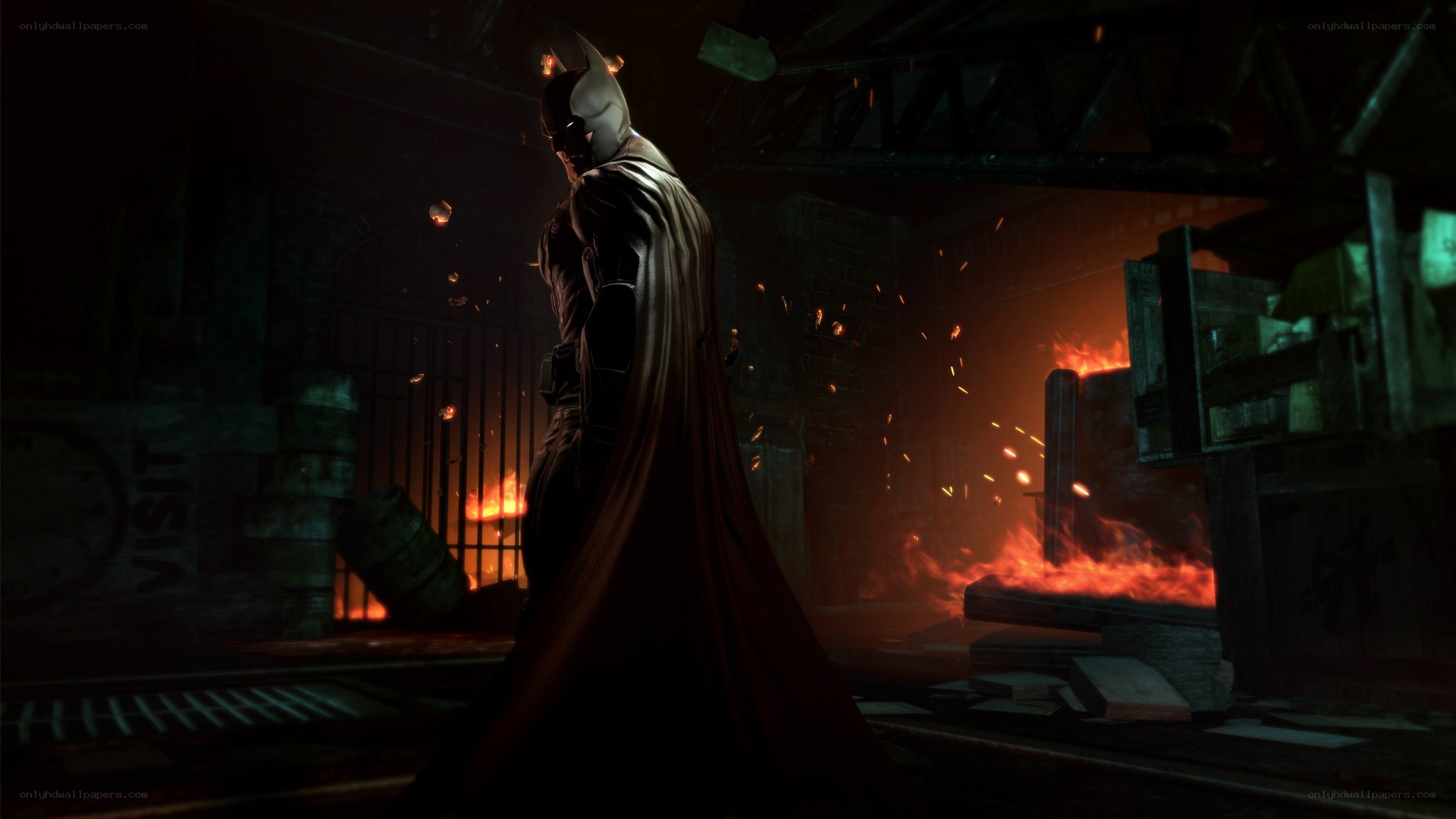 Batman in a burning warehouse