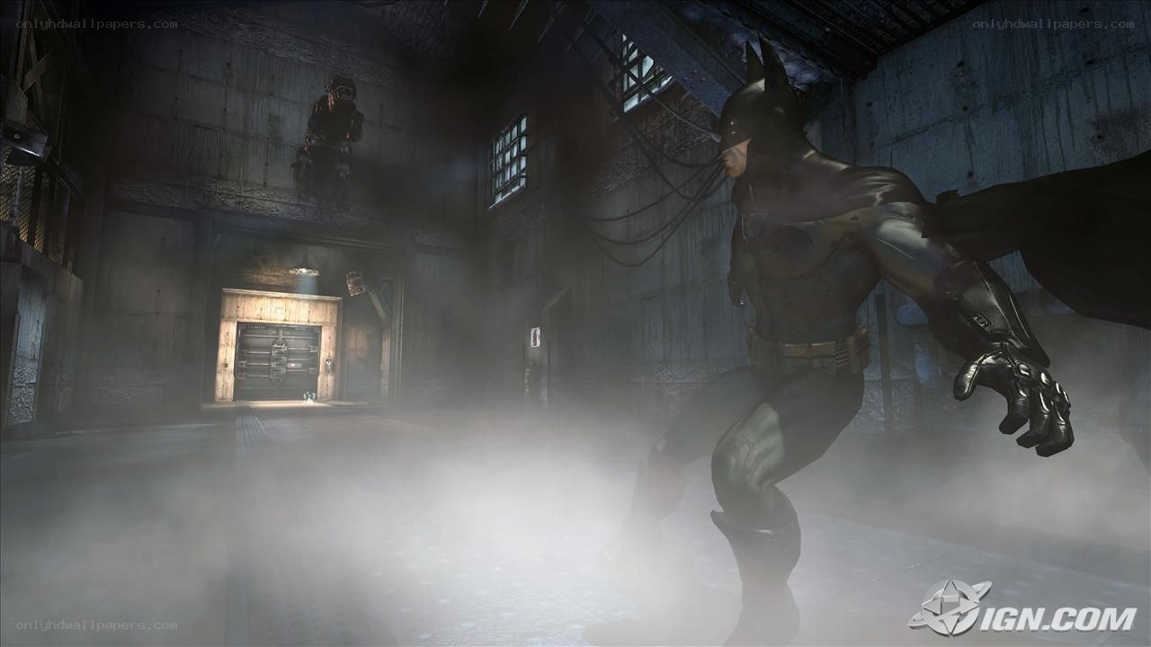 Batman in a dark warehouse