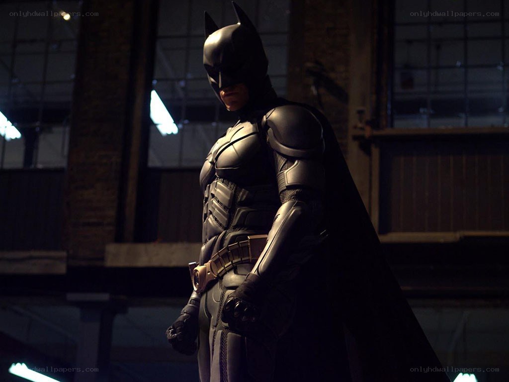 Batman in a dark warehouse