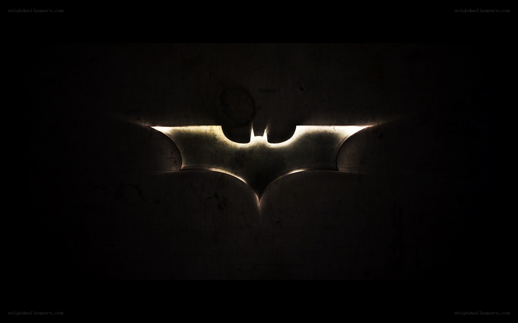 Batman logo in dark light