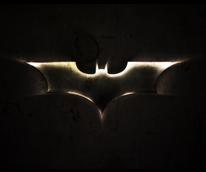 Batman logo in dark light