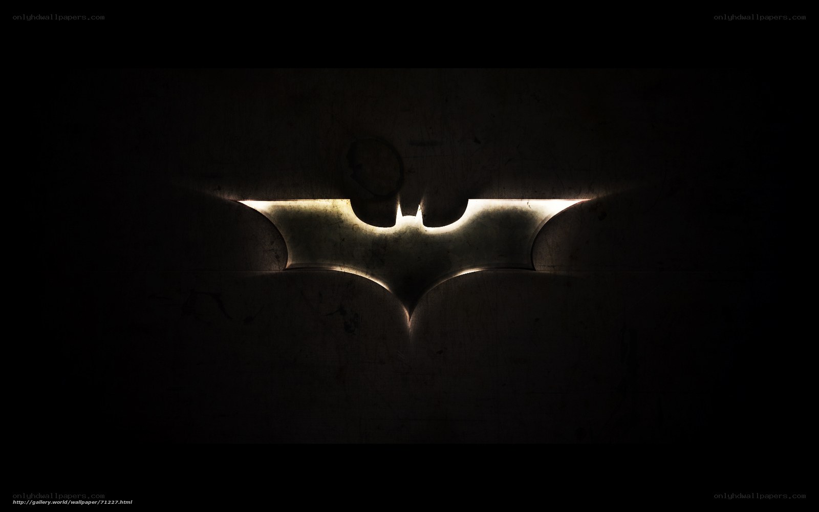 Batman logo in dark light