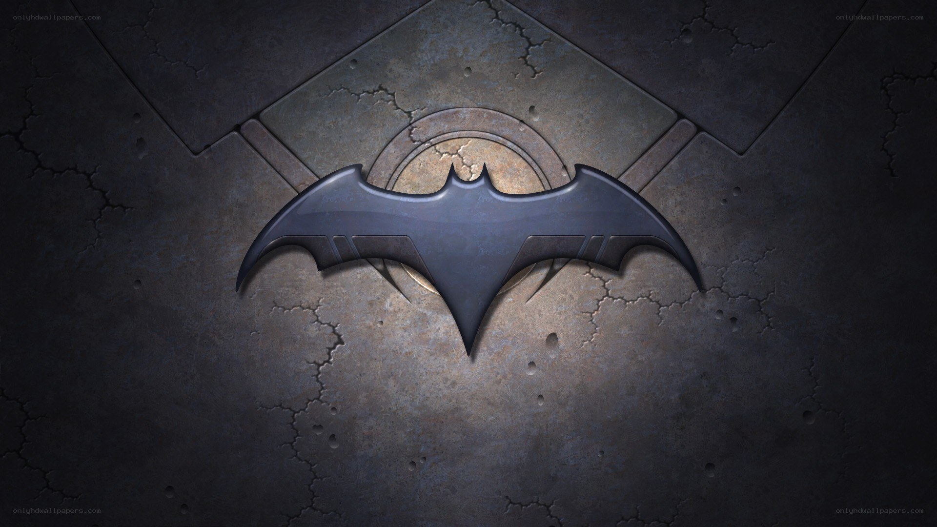 Batman logo on cracked stone