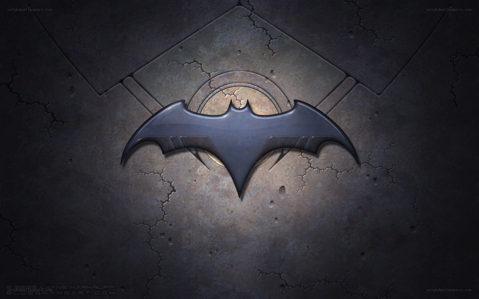 Batman logo on cracked wall
