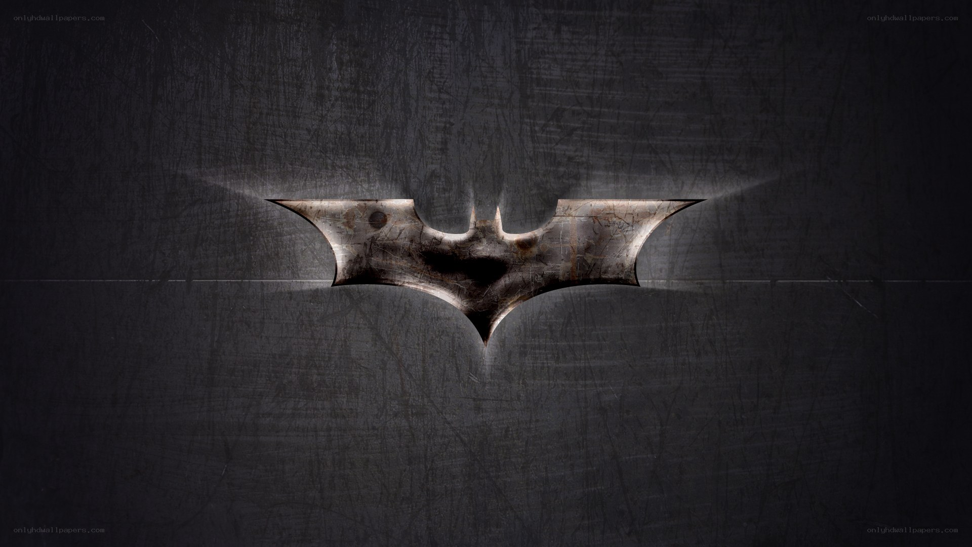 Batman logo on dark background