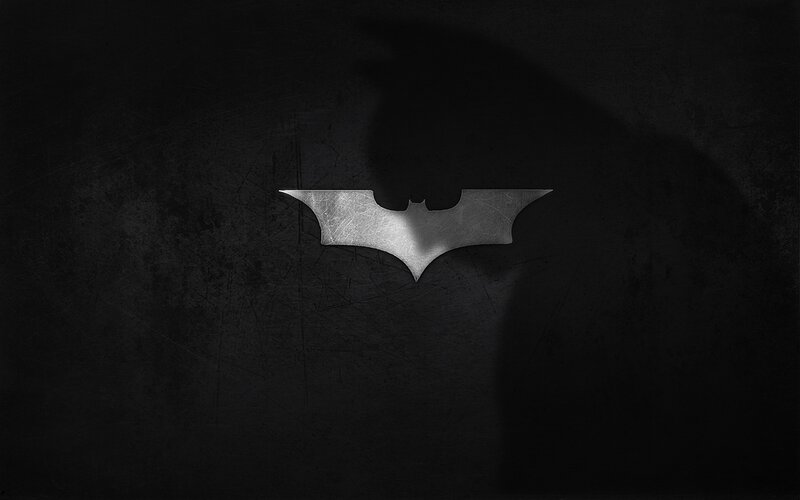 Batman logo on dark background