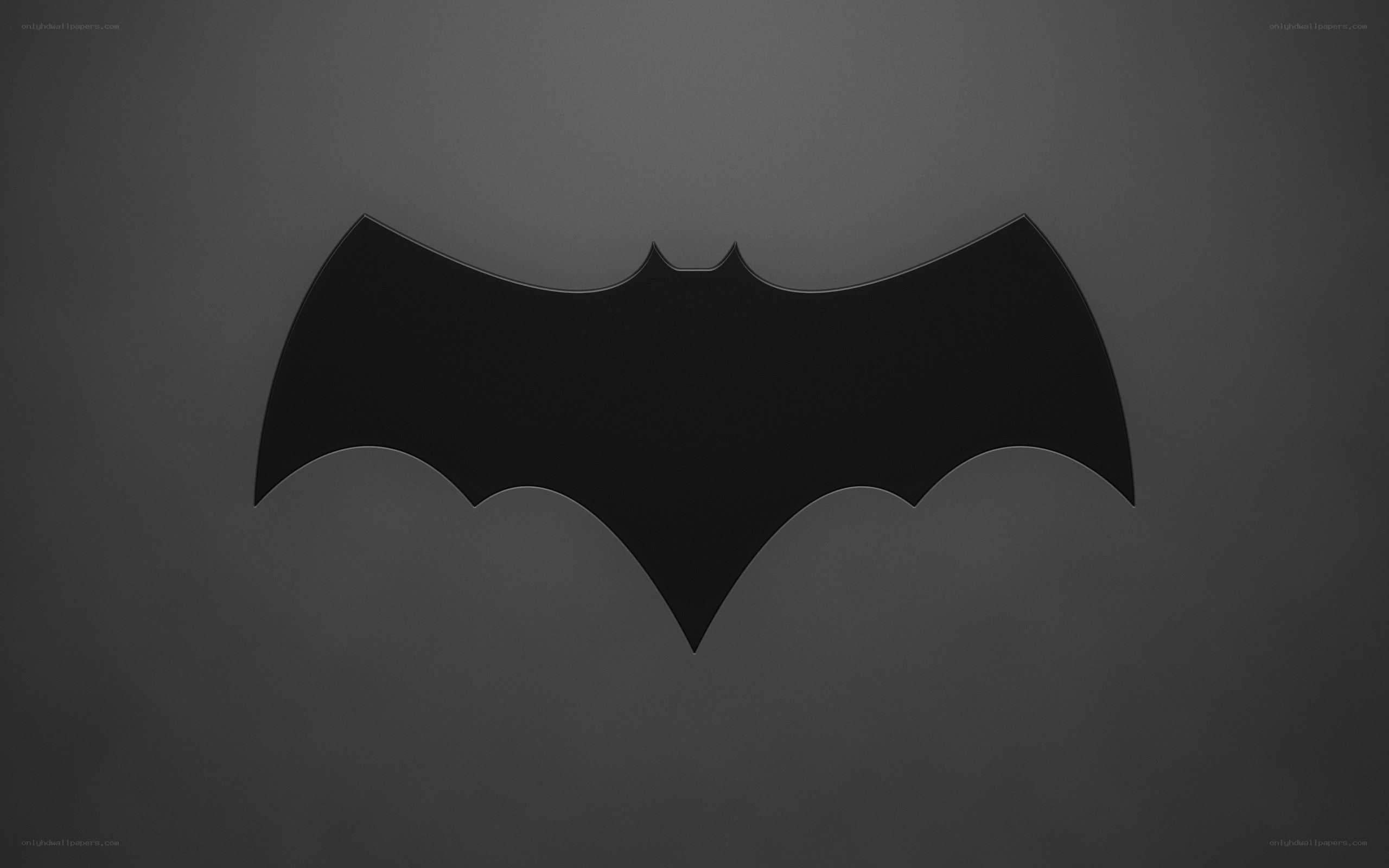 Batman logo on dark background