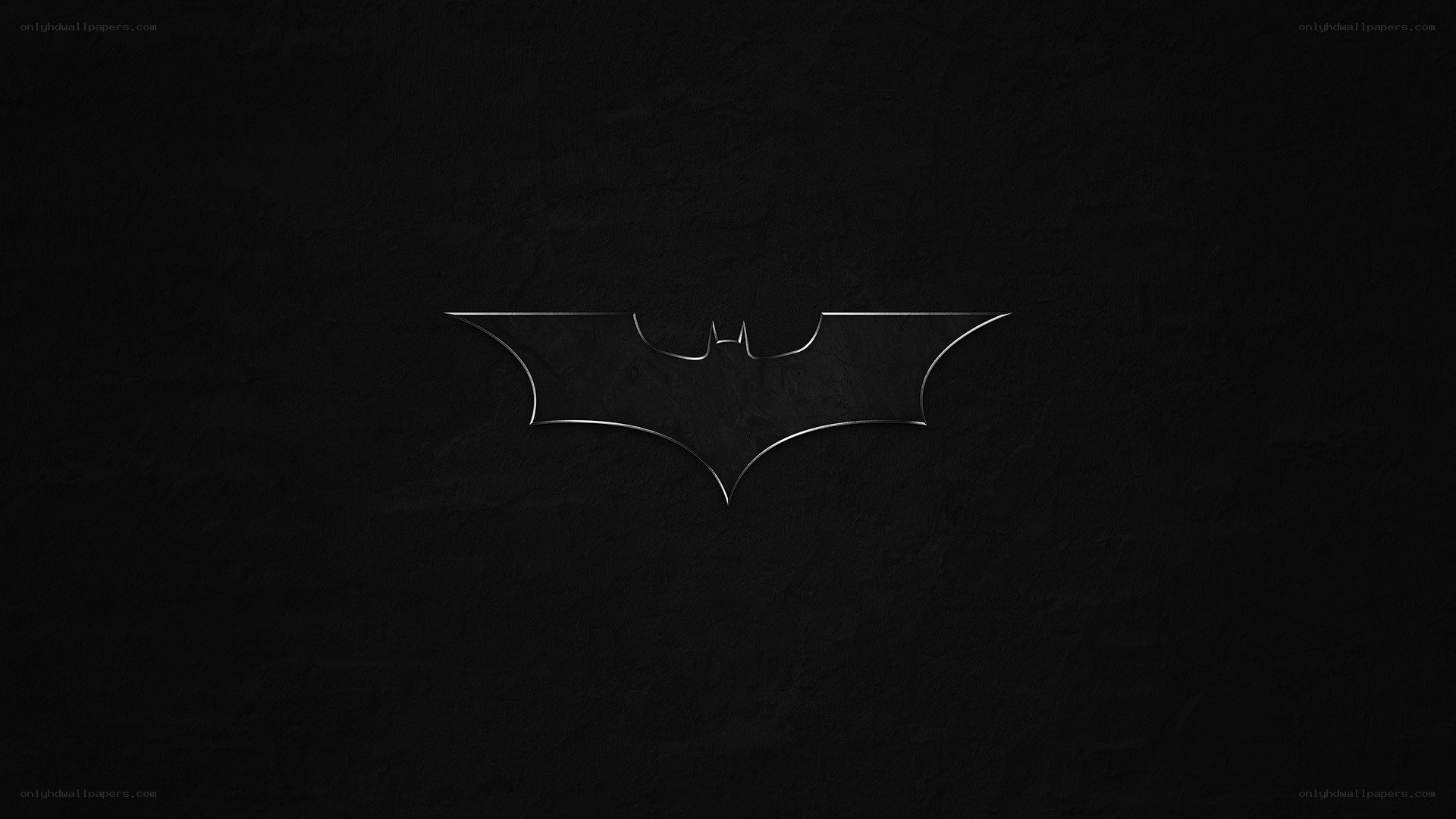 Batman logo on dark background