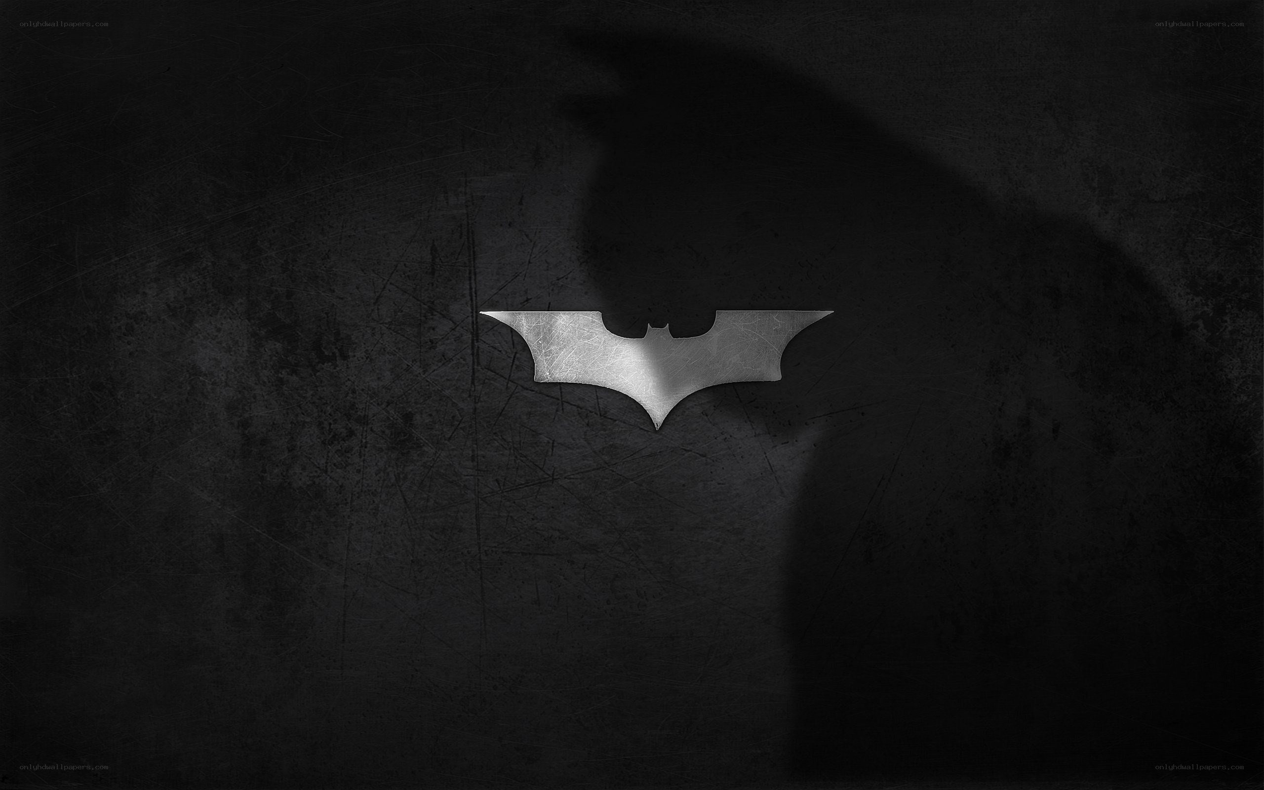 Batman logo on dark background