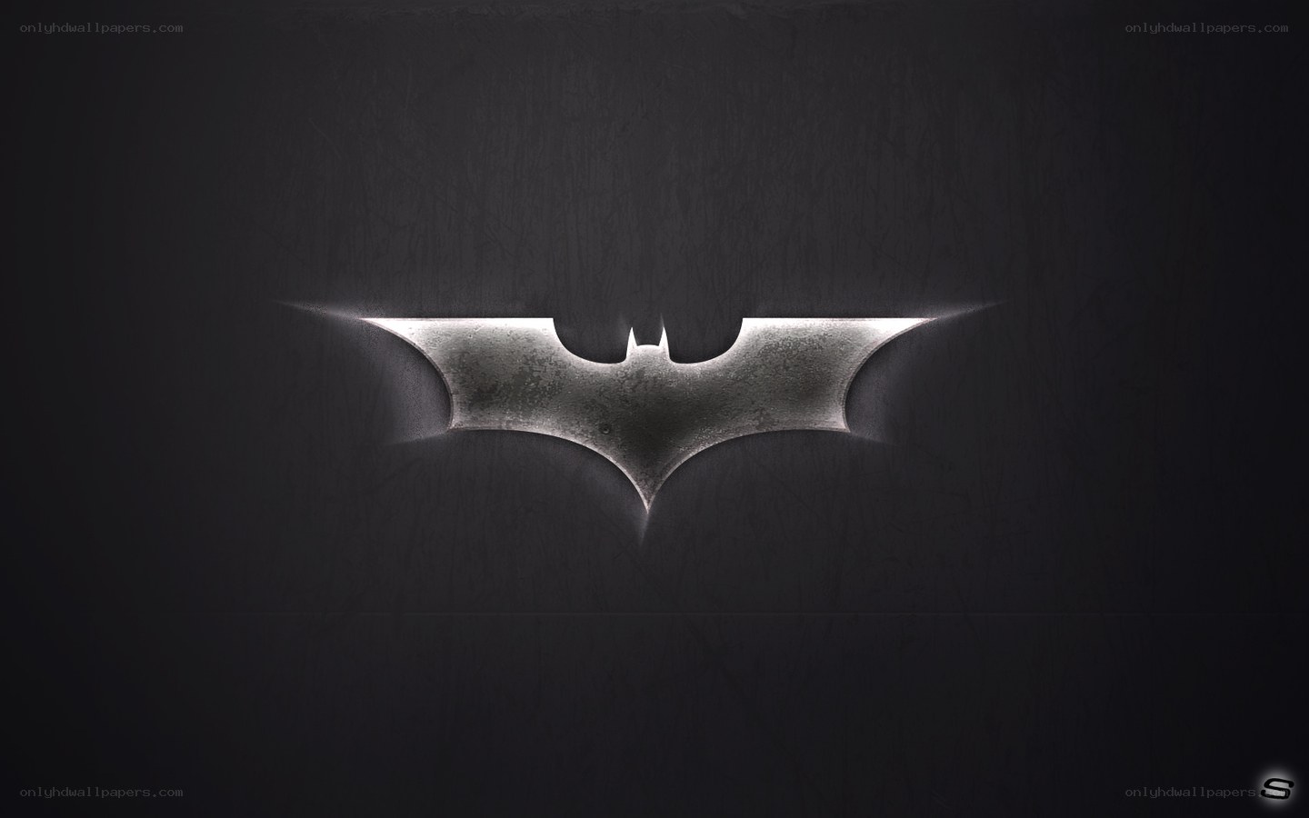 Batman logo on dark background