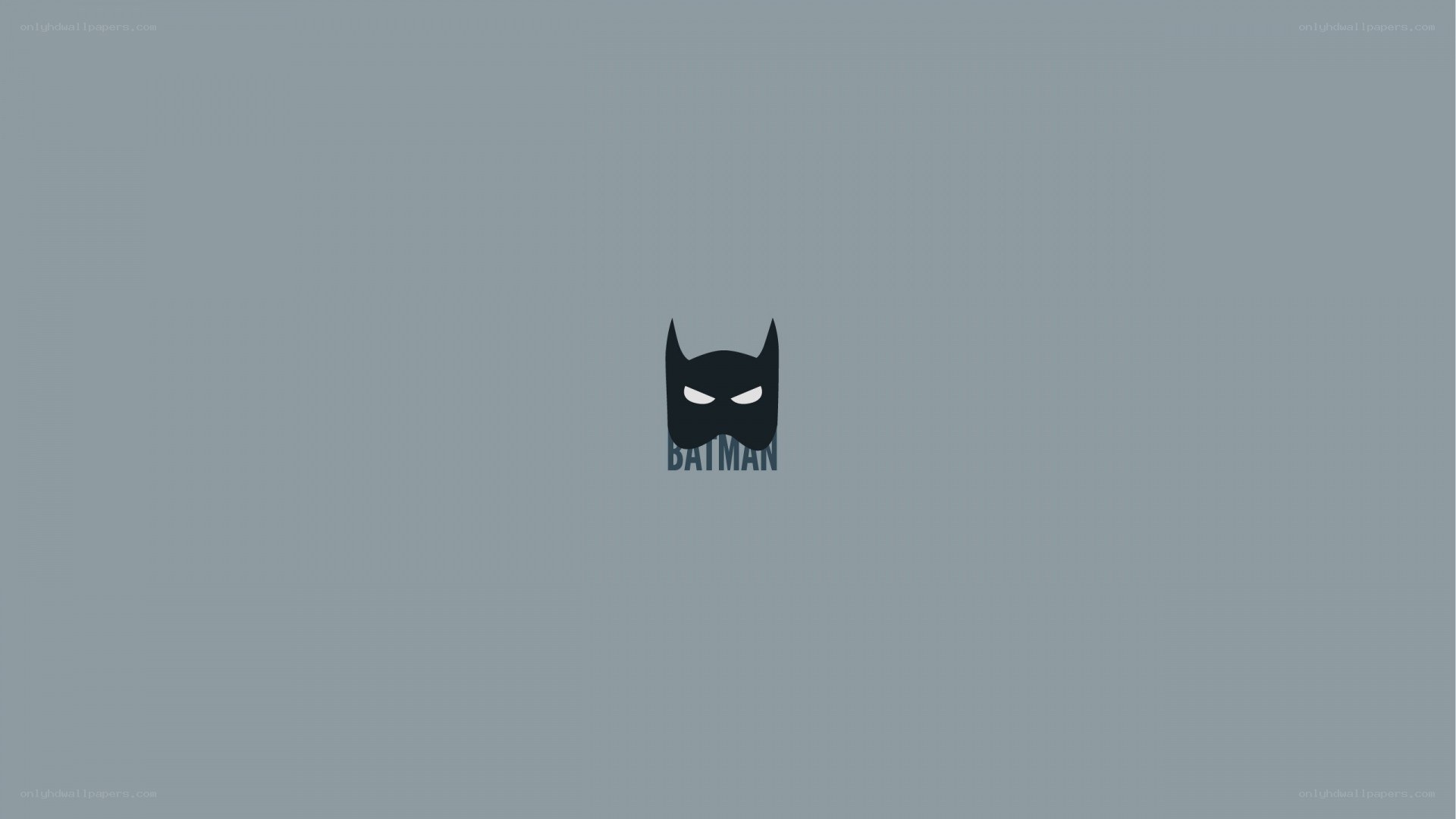 Batman logo on gray background