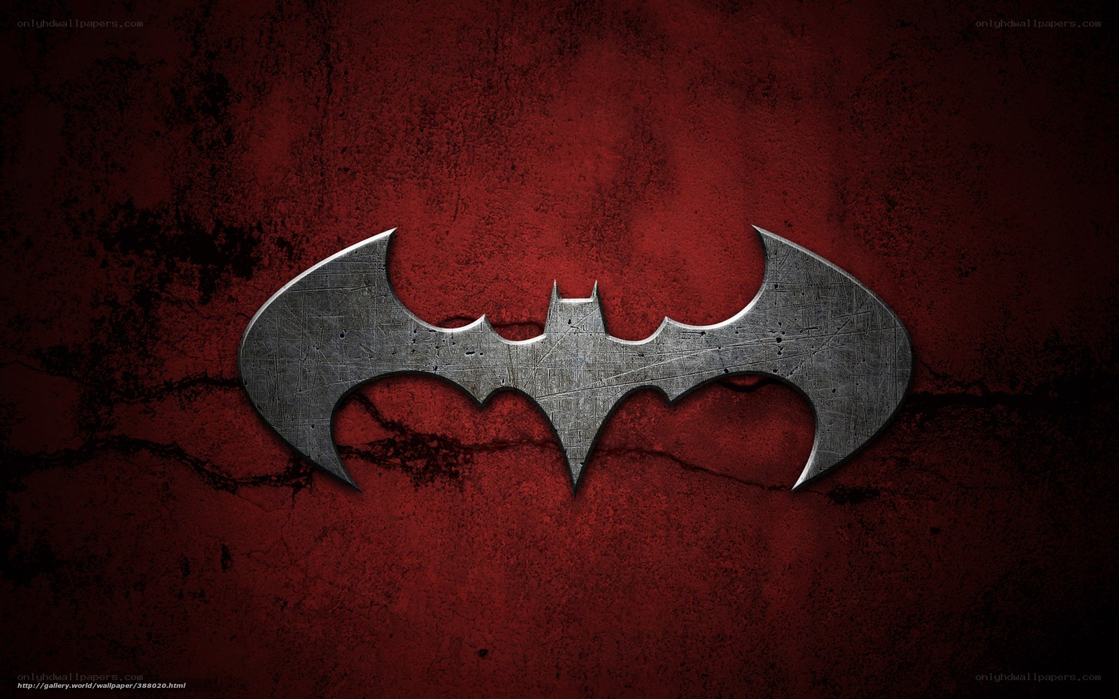 Batman logo on red wall