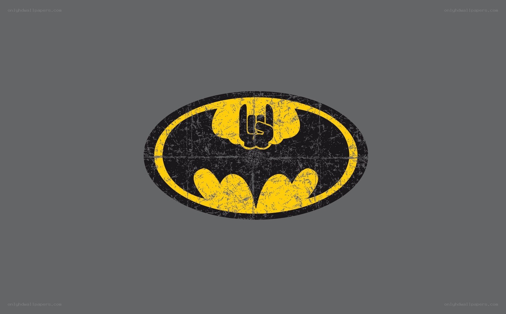 Batman logo with rock hand gesture