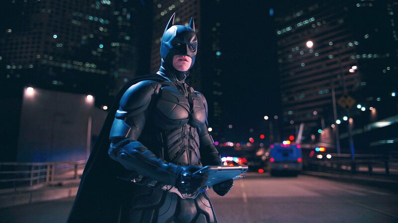 Batman on a city street at night