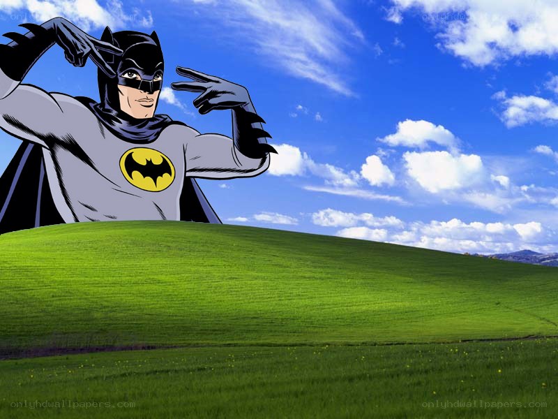 Batman on a green hill