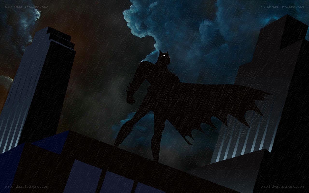 Batman on a rainy rooftop