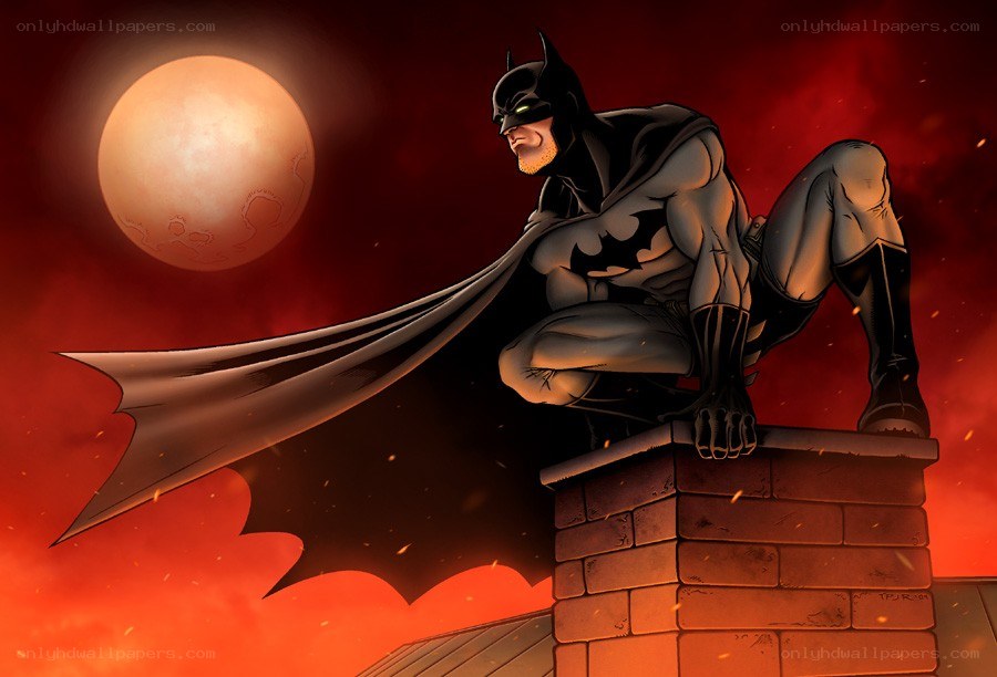 Batman on a rooftop at night